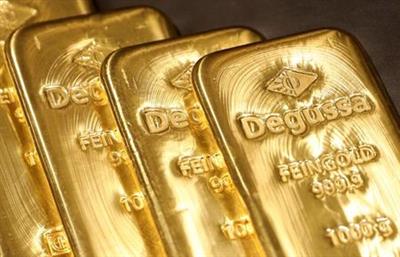 Gold bullions are displayed at Degussa shop in Singapore June 16, 2017. Picture taken June 16, 2017. REUTERS/Edgar Su