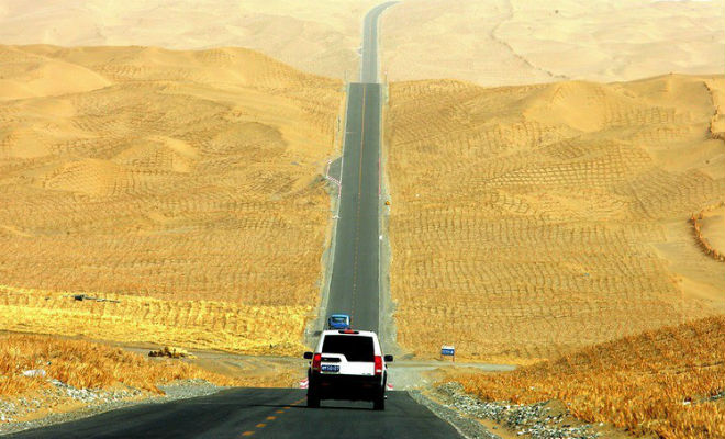 Таримское шоссе. Зачем китайцы построили 500 км дороги посреди пустыни Китай,проект,Пространство,пустыня,стройка,шоссе