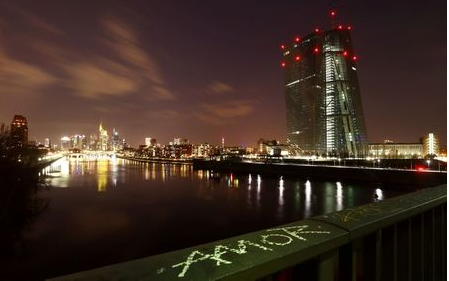 A word reading "Love" is written on a bridge railing with the city's skyline and the headquarters of the European Central Bank (ECB) seen in the background, as the spread of the coronavirus disease (COVID-19) continues in Frankfurt, Germany, March 21, 2021. REUTERS/Kai Pfaffenbach