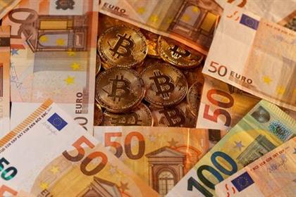 Representations of virtual currency Bitcoin and euro banknotes are seen in this picture illustration taken January 27, 2020. REUTERS/Dado Ruvic/Illustration REFILE - CORRECTING CURRENCY 