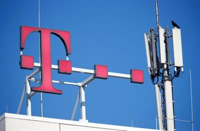 A crow rests on the GSM mobile phone antennas of Deutsche Telekom AG atop of the headquarters of German telecommunications giant in Bonn, Germany, February 19, 2019. REUTERS/Wolfgang Rattay