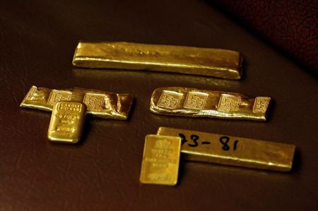 Gold ingots, inscribed with details, are displayed at a wholesale gold shop, as the coronavirus disease (COVID-19) outbreak continues, in Peshawar, Pakistan August 6, 2020. REUTERS/Fayaz Aziz