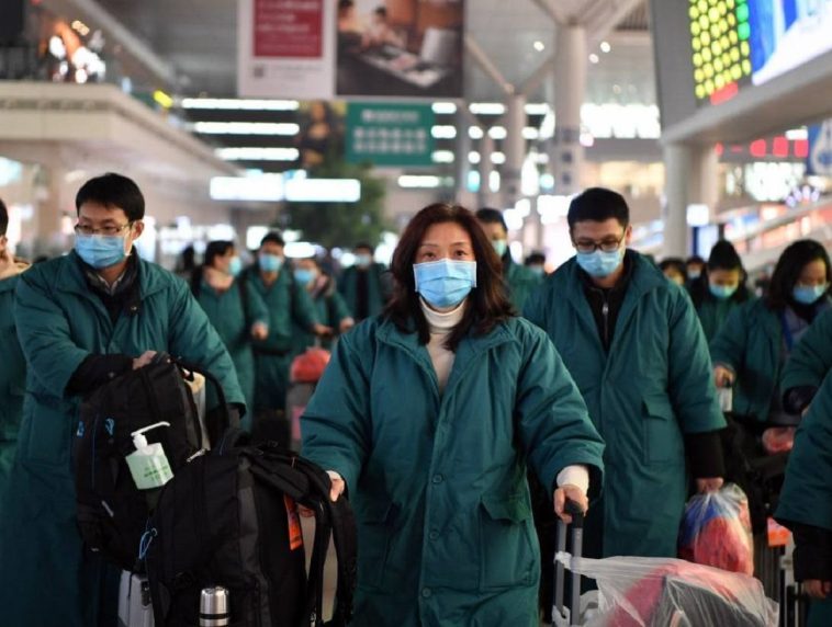 Китай открывает границы 9 января, несмотря на миллионы зараженных COVID-19