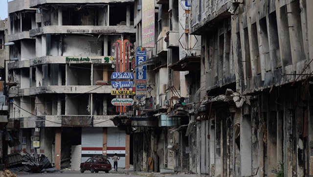 Разрушенные дома на одной из улиц Хомса. Архивное фото