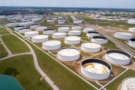 Crude oil storage tanks are seen in an aerial photograph at the Cushing oil hub in Cushing, Oklahoma, U.S. April 21, 2020. REUTERS/Drone Base