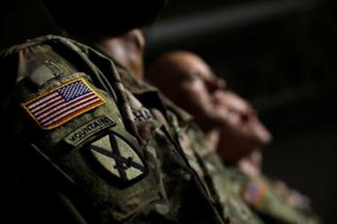 FILE PHOTO: U.S. Army 10th Mountain Division soldiers listen as President Donald Trump speaks before signing the National Defense Authorization Act at Fort Drum, New York, U.S., August 13, 2018. REUTERS/Carlos Barria