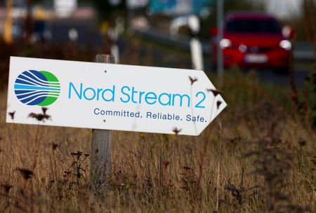 A road sign directs traffic towards the Nord Stream 2 gas line landfall facility entrance in Lubmin, Germany, September 10, 2020. REUTERS/Hannibal Hanschke 