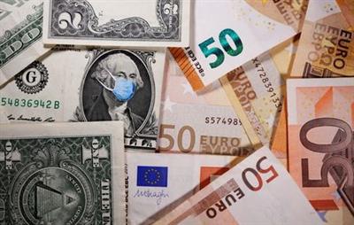 George Washington is seen with printed medical masks on the one Dollar near Euro banknotes in this illustration taken, March 31, 2020. REUTERS/Dado Ruvic/Illustration