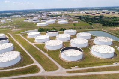 Crude oil storage tanks are seen in an aerial photograph at the Cushing oil hub in Cushing, Oklahoma, U.S. April 21, 2020. REUTERS/Drone Base