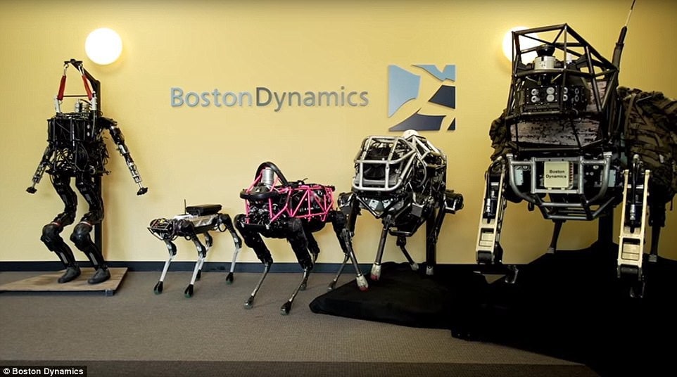 Meet the family: The new SpotMini (second from left) next to Boston Dynamics other machines.