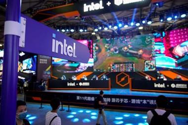 Visitors are seen at the Intel booth during the China Digital Entertainment Expo and Conference, also known as ChinaJoy, in Shanghai, China July 30, 2021. Picture taken July 30, 2021. REUTERS/Aly Song 