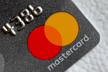FILE PHOTO: A Mastercard logo is seen on a credit card in this picture illustration August 30, 2017. REUTERS/Thomas White//File Photo