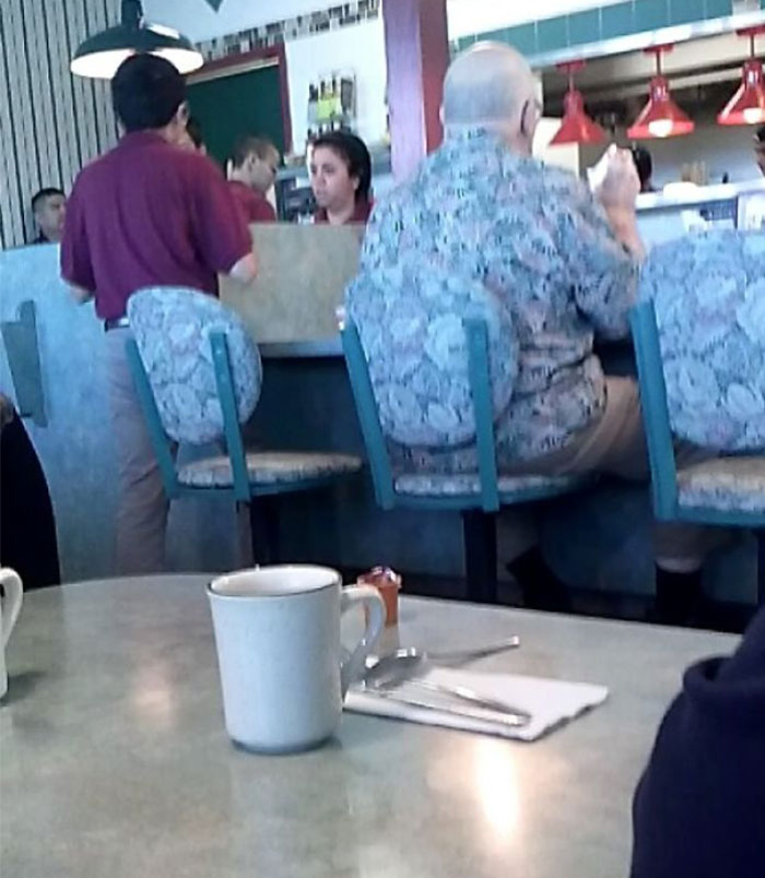 This Guy's Shirt Matches The Chair
