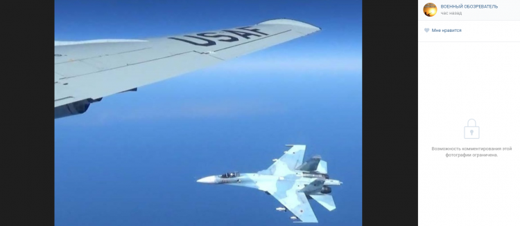 Военные США опубликовали в сети фото сближения Су-27 с американским разведчиком