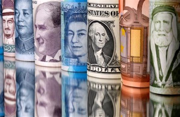 FILE PHOTO: Saudi riyal, yuan, Turkish lira, pound, U.S. dollar, euro and Jordanian dinar banknotes are seen in this illustration taken January 6, 2020. REUTERS/Dado Ruvic/Illustration 