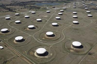 FILE PHOTO: Crude oil storage tanks are seen from above at the Cushing oil hub, in Cushing, Oklahoma, U.S., March 24, 2016. REUTERS/Nick Oxford