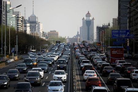 Cars are seen in a traffic jam during evening rush hour in Beijing, as the country is hit by an outbreak of the novel coronavirus disease (COVID-19), China April 8, 2020. REUTERS/Tingshu Wang