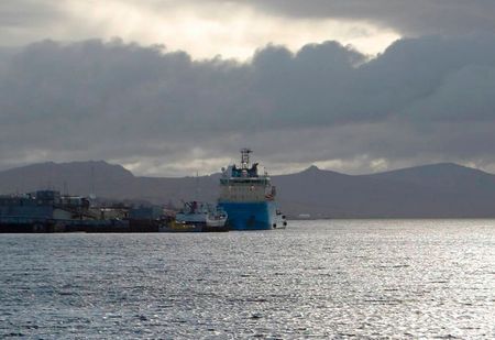 A Maersk supply boat loads up before sailing to the Ocean Guardian semi-submersible drilling rig contracted from Diamond Offshore Drilling by Desire Petroleum which began oil exploration some 150 km (93 miles) offshore from the Falkland Islands, in Port Stanley February 26, 2010. Argentina asked the United Nations to step into its dispute with Britain over the Islands, two days after the long-running dispute erupted again when Britain began the oil exploration. REUTERS/Gary Clement (FALKLAND ISLANDS - Tags: BUSINESS POLITICS ENERGY) QUALITY FROM SOURCE 