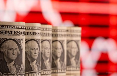 FILE PHOTO: U.S. one dollar banknotes are seen in front of displayed stock graph in this illustration taken February 8, 2021. REUTERS/Dado Ruvic/Illustration/File Photo/File Photo