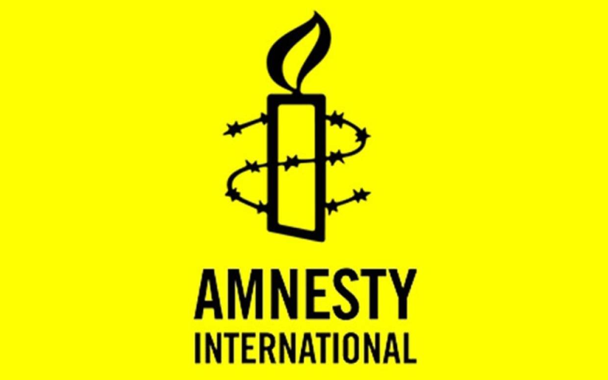 Амнистия компании. Amnesty International (Амнести Интернешнл). Amnesty International. «Международная амнистия» логотип. Правозащитная организация Международная амнистия. Эмблема Эмнести Интернейшнл.