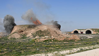 Последствия ракетного удара США по авиабазе в Сирии. Архивное фото
