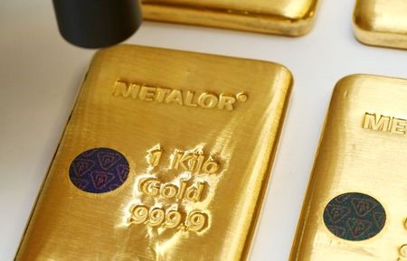 The Sicpa Oasis validator system (bullion protect) is pictured on one kilogram bar of gold at Swiss refiner Metalor in Marin near Neuchatel, Switzerland July 5, 2019. Picture taken July 5, 2019. To match Special Report GOLD-SWISS/FAKES REUTERS/Denis Balibouse