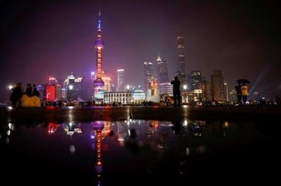 A general view of the financial district of Pudong during Earth Hour, in Shanghai, China March 27, 2021. REUTERS/Aly Song REFILE - CORRECTING TIMING