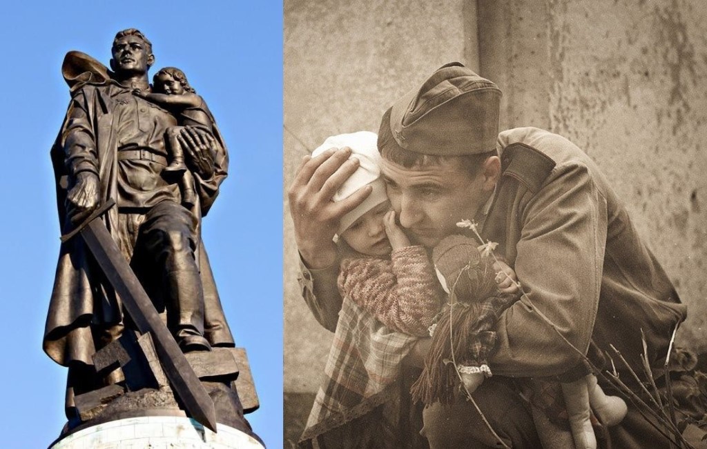Памятник солдат с ребенком на руках фото