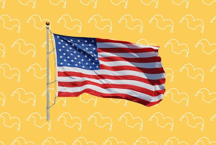 An American flag over a yellow background