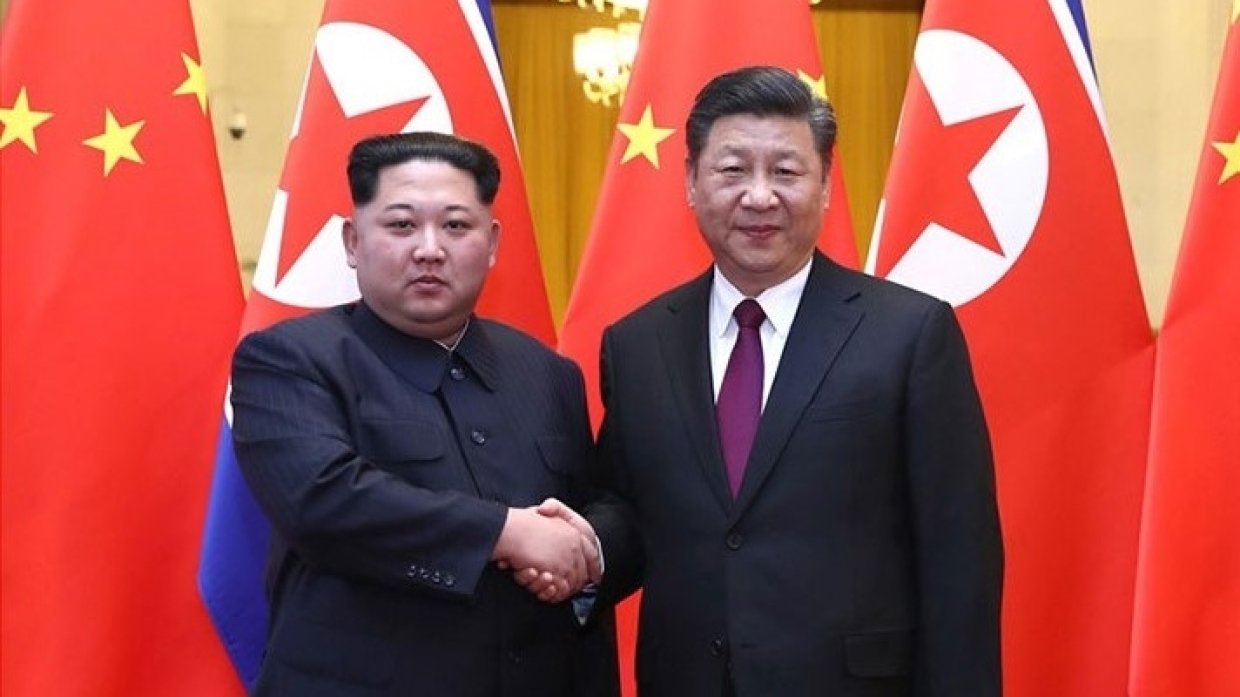 Глава КНДР Ким Чен Ын и глава КНР Си Цзиньпин
