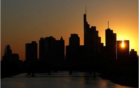The skyline with its financial district is photographed during sunset in Frankfurt, Germany, April 22, 2020, as the spread of the coronavirus disease (COVID-19) continues. REUTERS/Kai Pfaffenbach