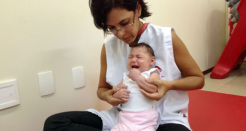 woman with Zika-infected baby