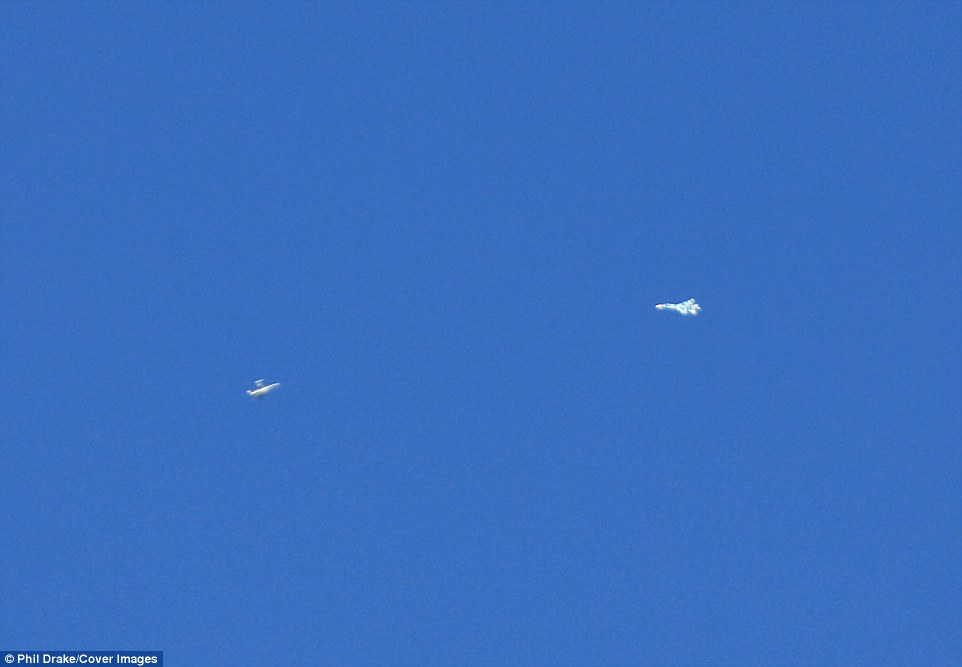 Here the F-16, left, approaches the Russian-built jet, right, during the mock dogfight high above the Nevada desert 