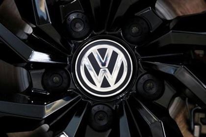 The logo of German carmaker Volkswagen is seen on a rim cap in a showroom of a Volkswagen car dealer in Brussels, Belgium July 9, 2020. REUTERS/Francois Lenoir 