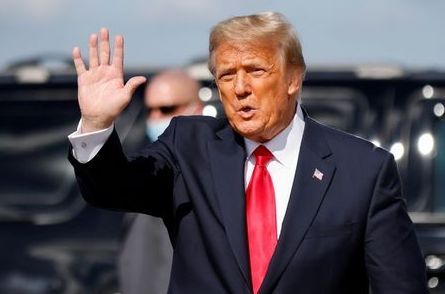 FILE PHOTO: U.S. President Donald Trump waves as he arrives at Palm Beach International Airport in West Palm Beach, Florida, U.S., January 20, 2021. REUTERS/Carlos Barria