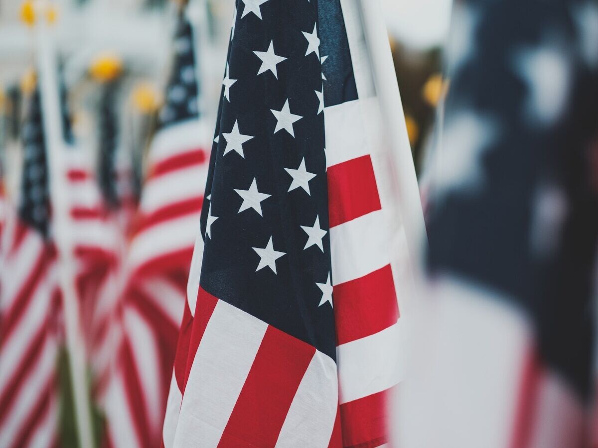 Флаг США© Unsplash/Osman Rana