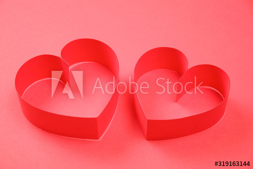 Pair of red paper hearts on red background. Good love, valentines day, womens day banner, offer, card, invitation, flyer, poster template.