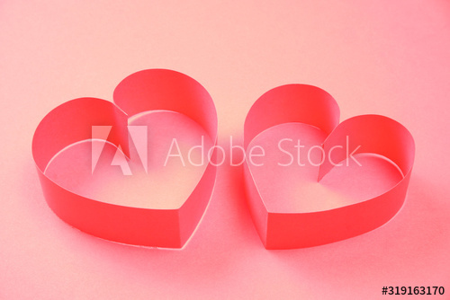 Couple of red paper hearts on pink background. Good love, valentines day, womens day banner, offer, card, invitation, flyer, poster template.