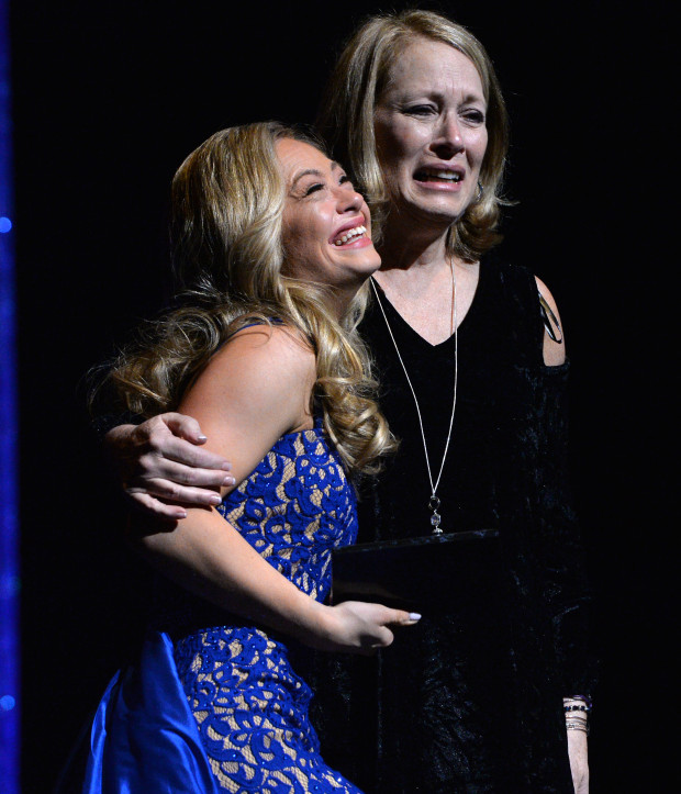 Mikayla Holmgren accepts the 