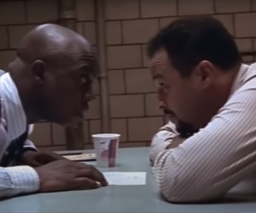 Pembleton and Lewis have a staring contest on Homicide: Life On The Streets