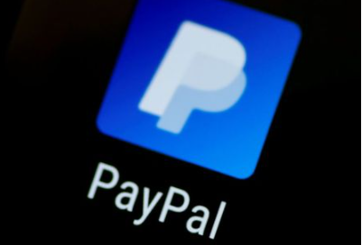 FILE PHOTO: The PayPal app logo seen on a mobile phone in this illustration photo October 16, 2017. REUTERS/Thomas White/Illustration//File Photo