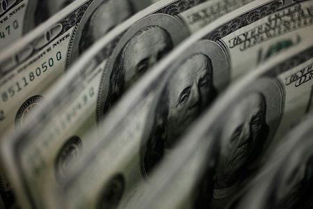 A picture illustration shows U.S. 100 dollar bank notes taken in Tokyo August 2, 2011. The Swiss franc rose to a record high against the euro and was close to a record versus the dollar on Tuesday as concerns about euro zone sovereign debt problems and a slowdown in the global economy buoyed demand for the safe-haven currency. REUTERS/Yuriko Nakao (JAPAN - Tags: BUSINESS POLITICS)