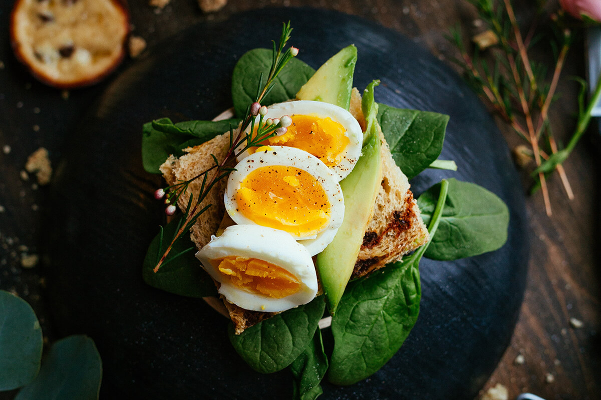 Start the day right with vibrant green veg and an oozing poached egg.