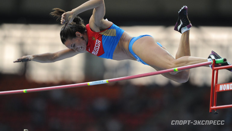 Прыжок с шестом исинбаева. Исинбаева Олимпийская чемпионка.