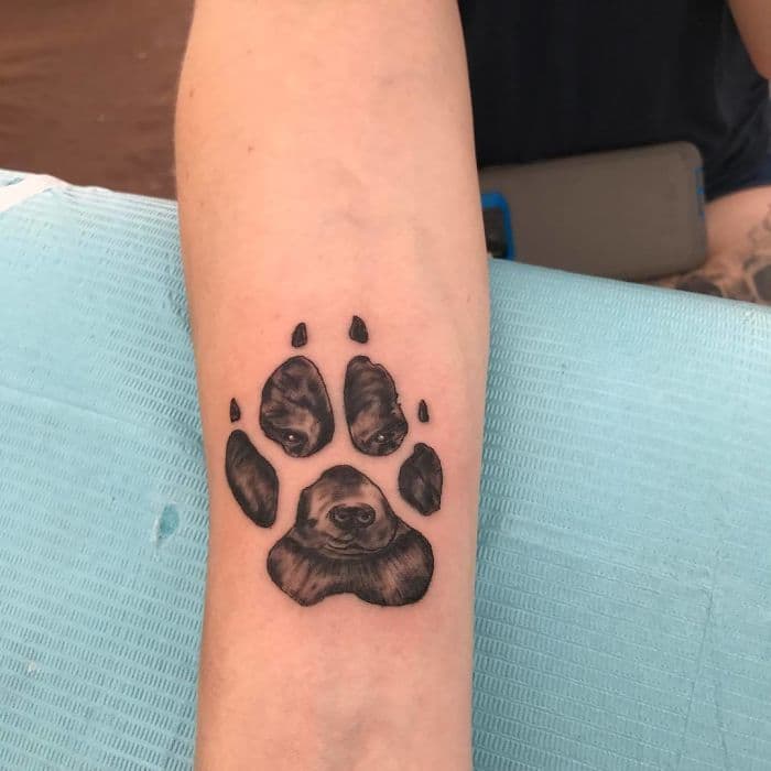 The Paws Of The Dogs Are Being Tattooed On Their Owners And The Result Is Adorable