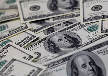 FILE PHOTO: U.S. one hundred dollar notes are seen in this picture illustration taken in Seoul February 7, 2011. REUTERS/Lee Jae-Won