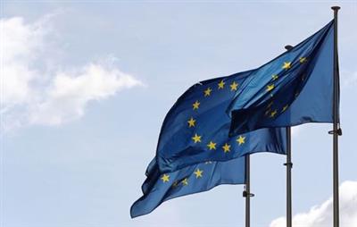 FILE PHOTO: The European Union flags flutter ahead of the gas talks between the EU, Russia and Ukraine at the EU Commission headquarters in Brussels, Belgium September 19, 2019. REUTERS/Yves Herman