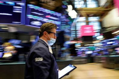 A trader works on the floor of the New York Stock Exchange (NYSE) in New York City, New York, U.S., July 21, 2021. REUTERS/Brendan McDermid