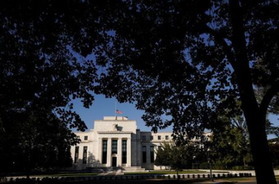 FILE PHOTO: The Federal Reserve building is seen in Washington, U.S., October 20, 2021. REUTERS/Joshua Roberts/File Photo