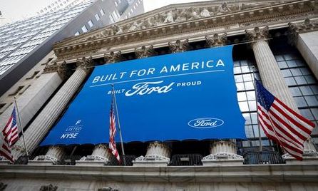 A Ford Motor Co. banner is displayed outside the New York Stock Exchange (NYSE) in New York, U.S., August 17, 2020. REUTERS/Brendan McDermid